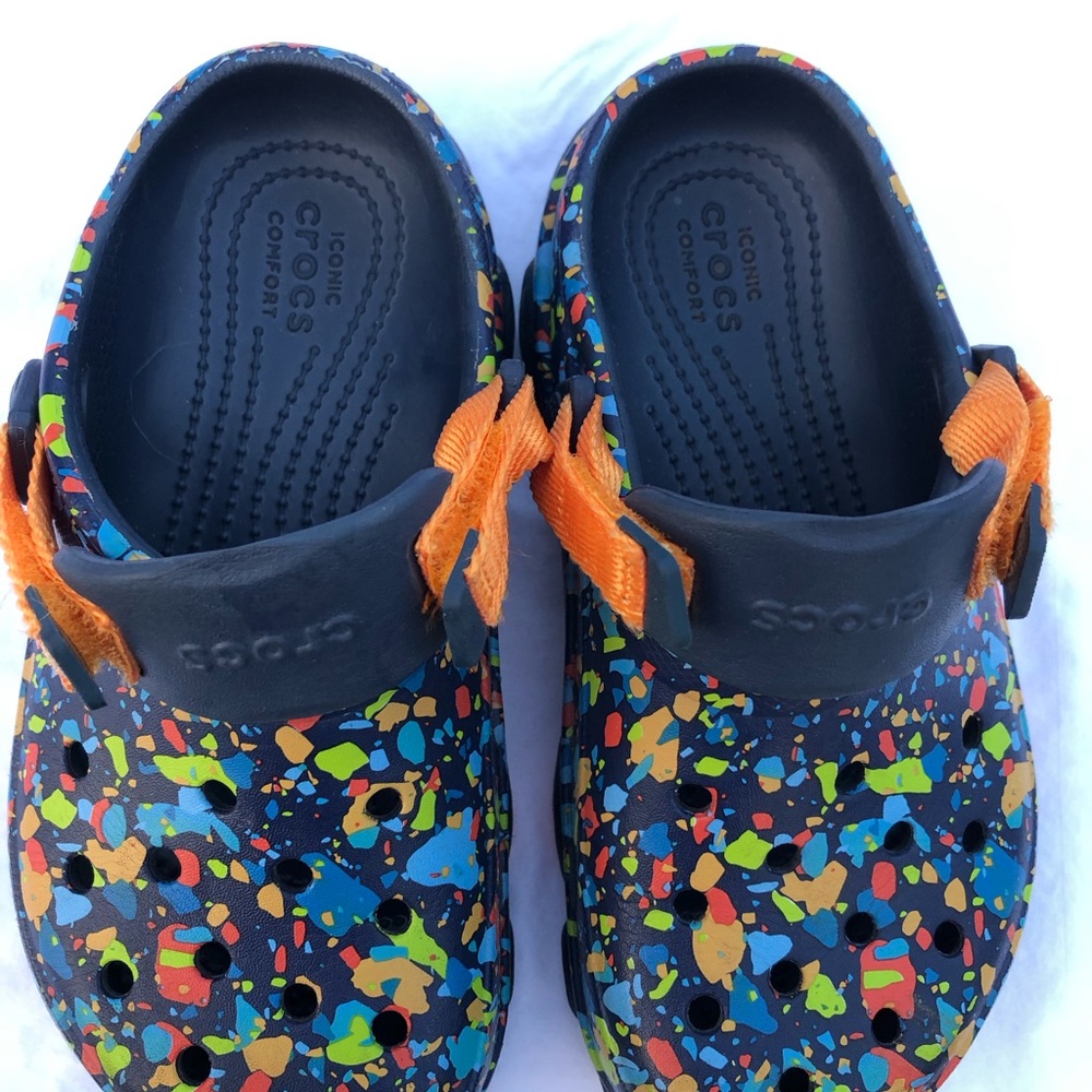 Crocs- multi color. Worn twice.